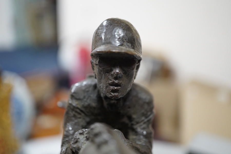 June Harrah (American), a bronze group of a racehorse and rider, on a naturalistic green marble base, 30cm high, with paperwork including provenance and exhibition leaflet. Condition - good
